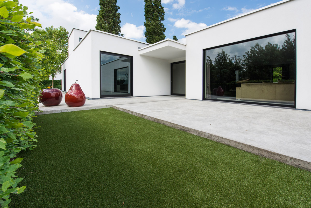 Artificial grass beside paving